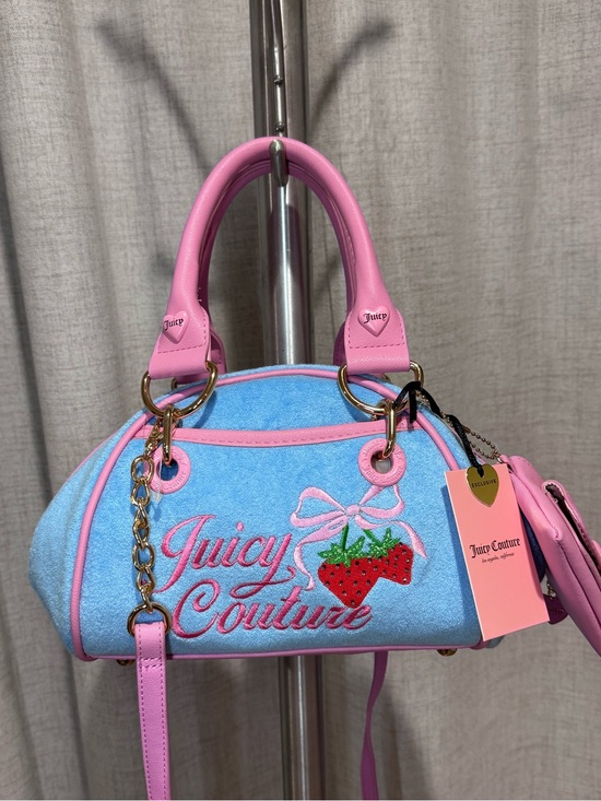 Juicy Couture Handbags - Juicy Couture Blue Mini Barrel Bag with Pink Trim